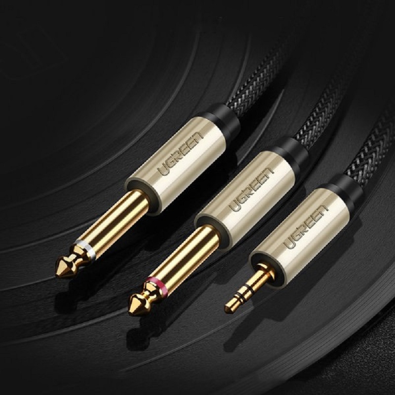 Ugreen 10613 cáp audio 3.5mm ra hai đầu 6.5mm dài 1M mạ vàng 24K cao câp (màu xám)